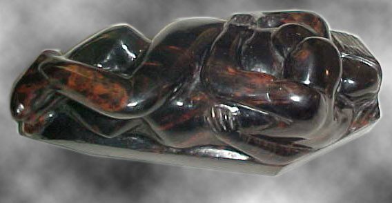 Coffin Embrace Carving